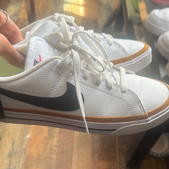 Nike Men's White and Black Sneakers with Gold Accents - Picture 1 of 3